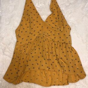 Yellow tie around the neck shirt